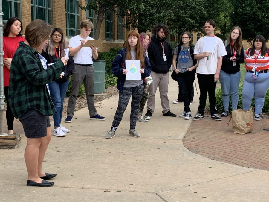 Students stage a walkout to raise awareness about climate change