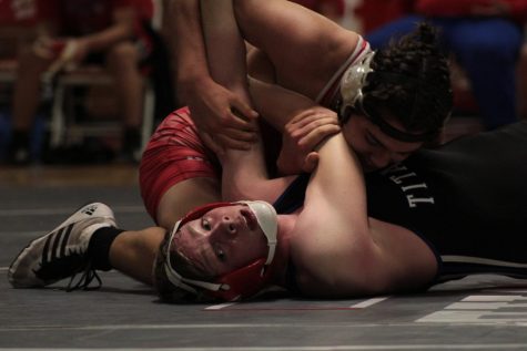 Wrestling opens season with sweep