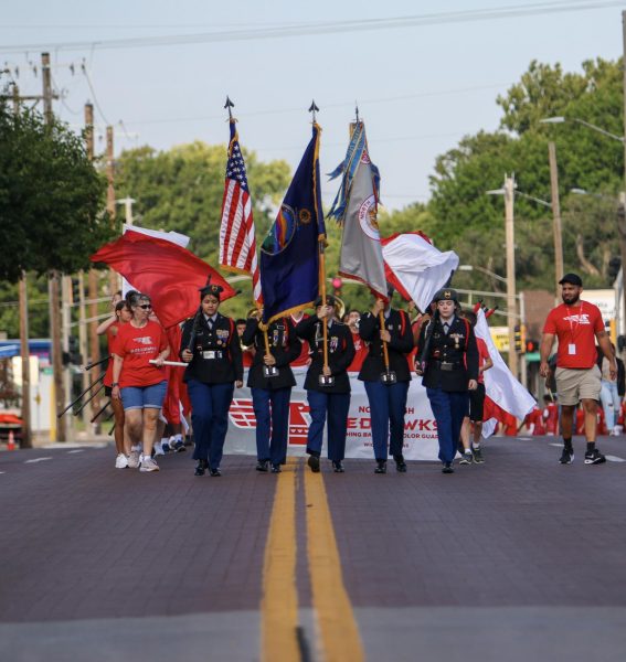 Students in the JROTC program lead the fall sports athletes during the parade at the annual Pancake Feed.