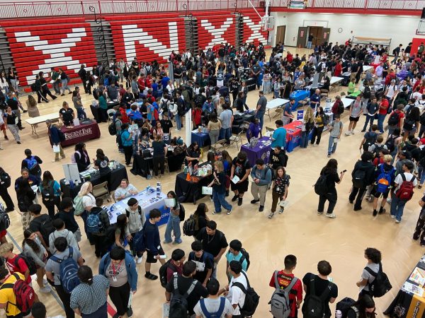 Juniors and Seniors walk through the new gym and visit with colleges and future employers at the college and career fair. 