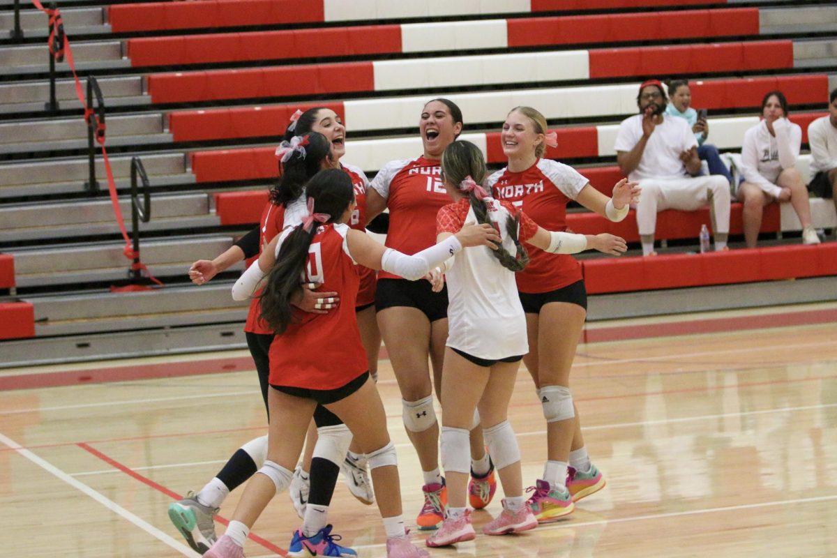 North celebrates scoring a point against Campus.