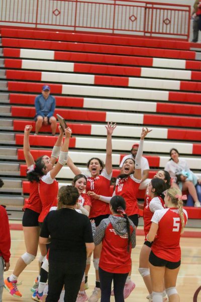 The volleyball team celebrates wining sub-state for the first time in 20 years.