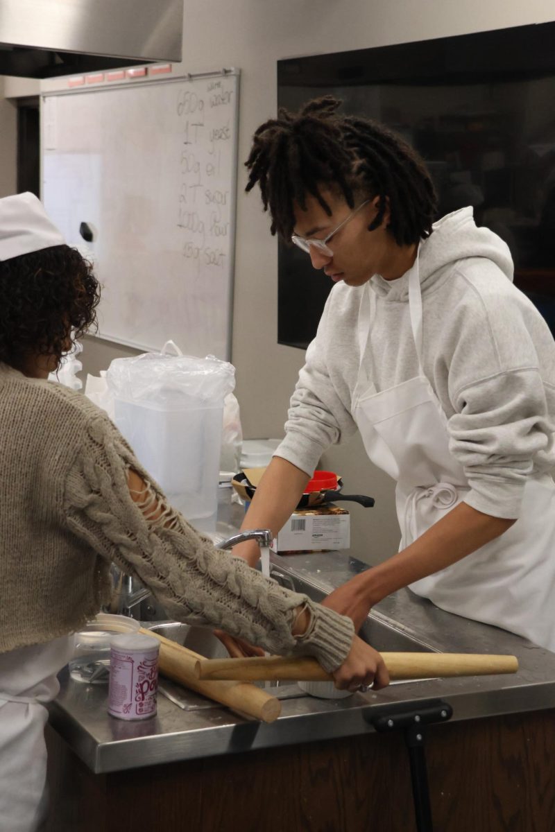 Students from culinary and German classes get together to make traditional German cookies to celebrate St. Martin's Day.