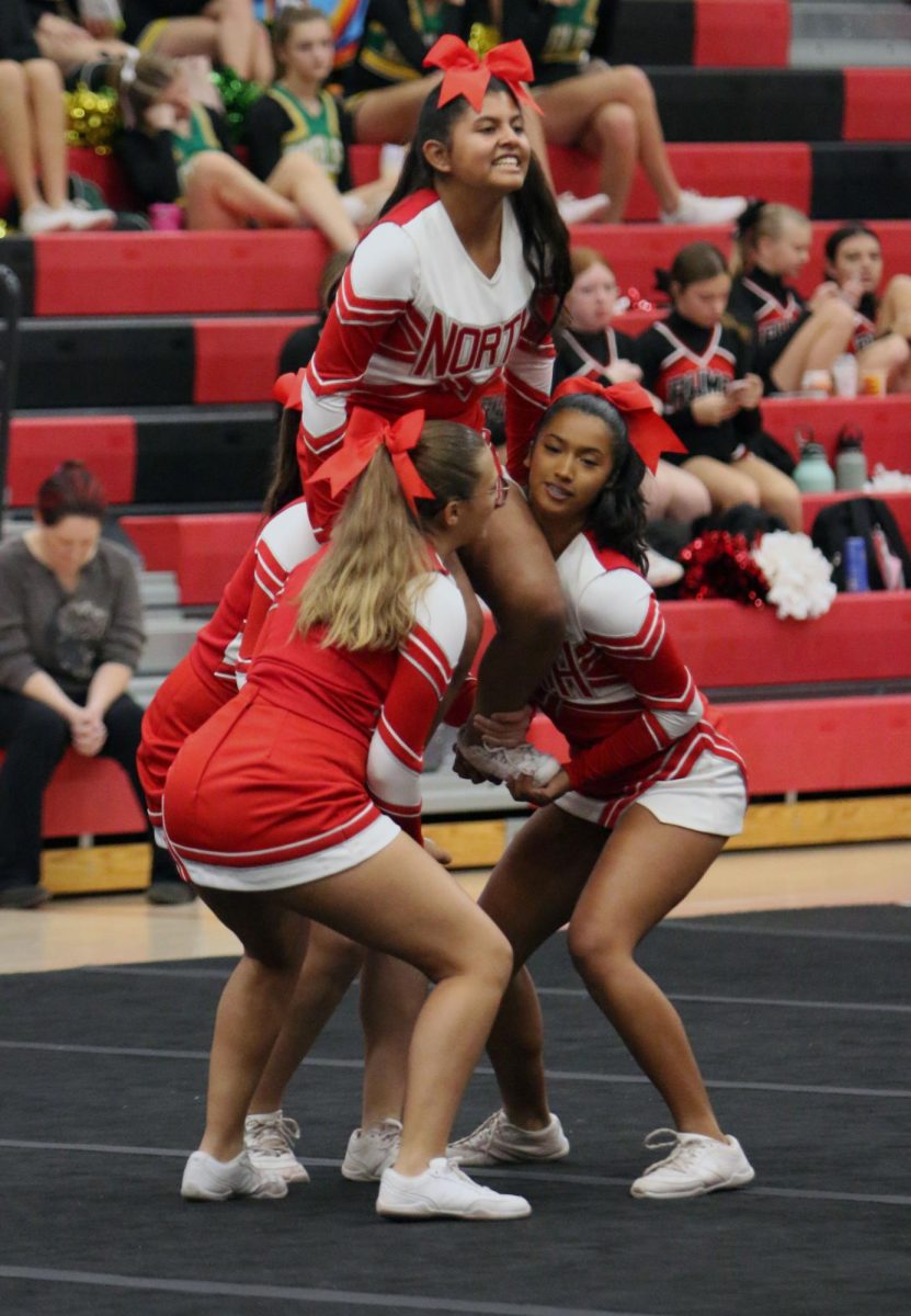 North Senior Ana Rojas gets ready to perform a stunt at the Height High Cheer Show.