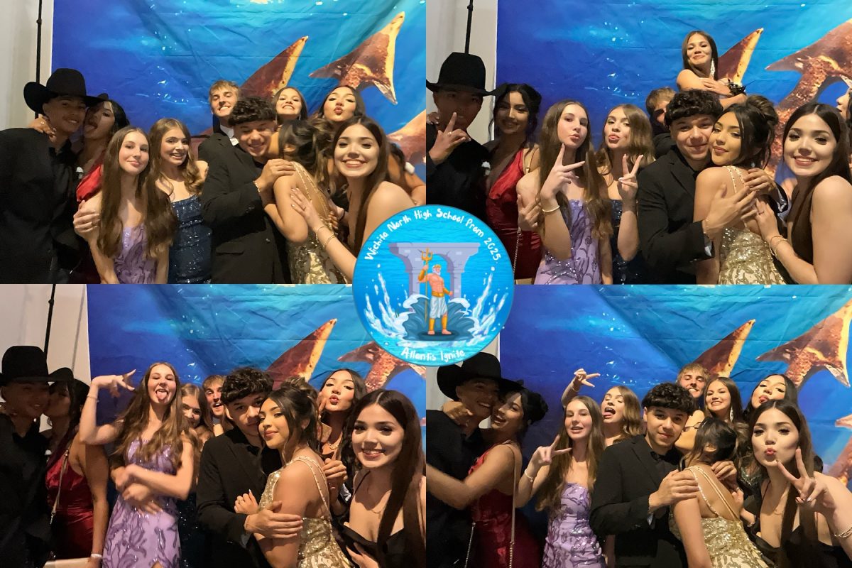 Students pose at one of the multiple photo booth stations at prom.